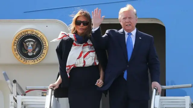 Президент США Дональд Трамп с супругой во время своего первого государственного визита в 2019 году