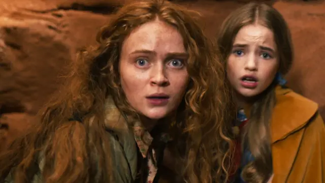 Sadie Sink e Nell Fisher interpretam Max e Holly, que se refugiam em uma caverna
