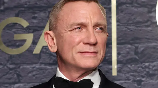 Daniel Craig in a suit as James Bond