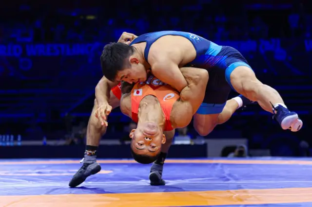 Жоламан Шаршенбеков менен жапандык Фумита Кеничиронун беттеши. Кыргыз балбан атаандашын 11:6 эсебинде жеңип алган. 2023-жылдын сентябры