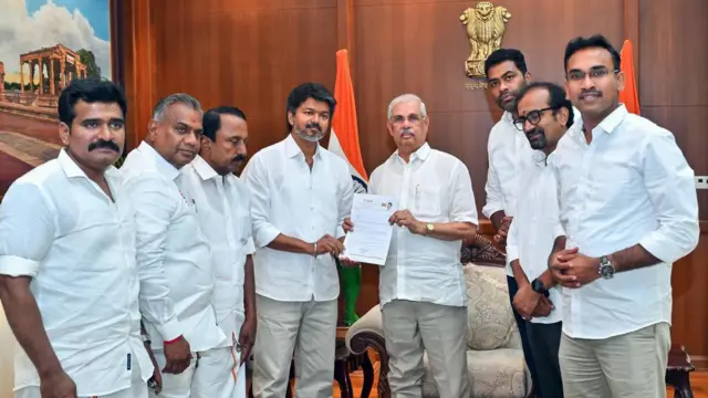 Vijay with Tamil Nadu governor and other TVK party leaders