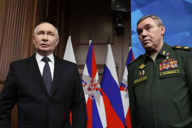 Путин и Герасимов стоят на фоне воинских знамен
