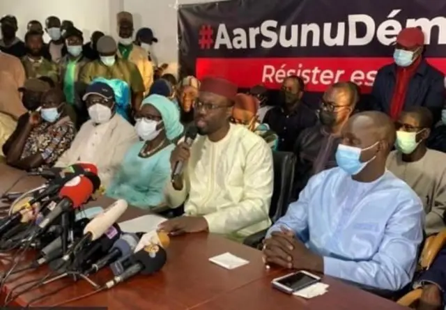 Men addressing media 