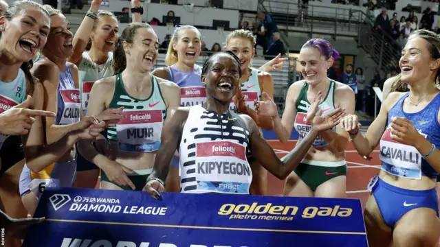 Faith Kipyegon celebrates setting the women's 1500m world record in June 2023