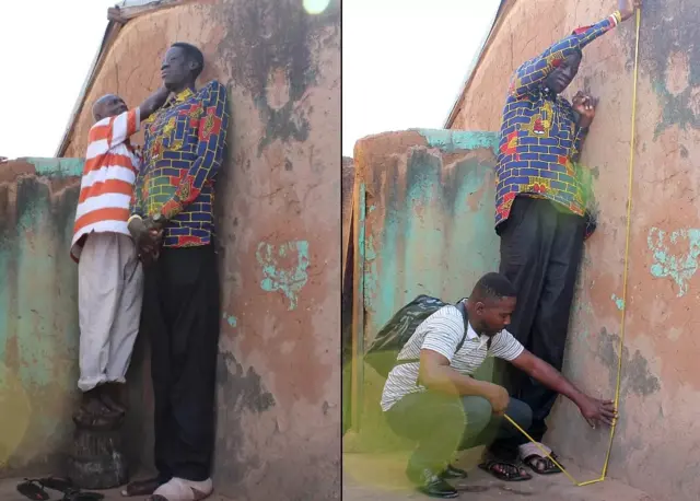 Awuche se faisant mesurer.