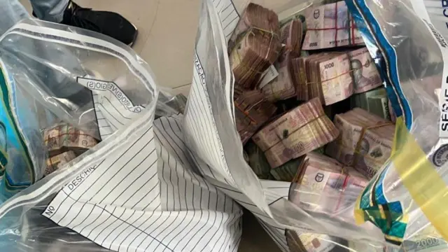 For Angola dem arrest 25 pipo following investigations into informal value transfer systems and authorities seize approximately $588,000 as part of di Operation Catalyst
