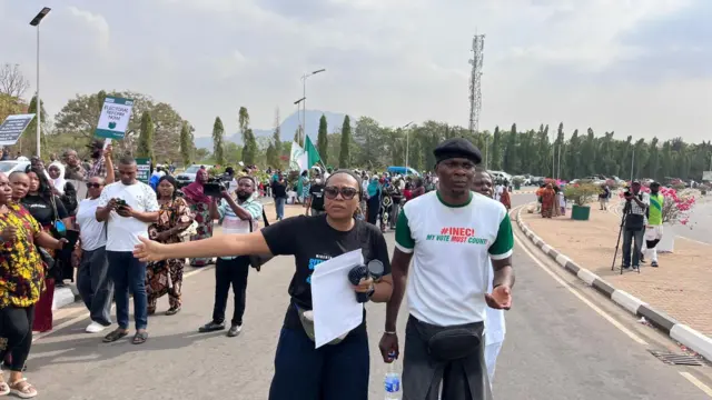 Nigerians protest against against rejection of electronic transmission of election result for National Assembly complex for Abuja on Monday, 9 February