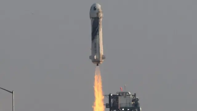 Billionaire businessman Jeff Bezos is launched with three crew members aboard a New Shepard rocket on the world's first unpiloted suborbital flight from Blue Origin's Launch Site 1 near Van Horn, Texas, US on 20 July 2021