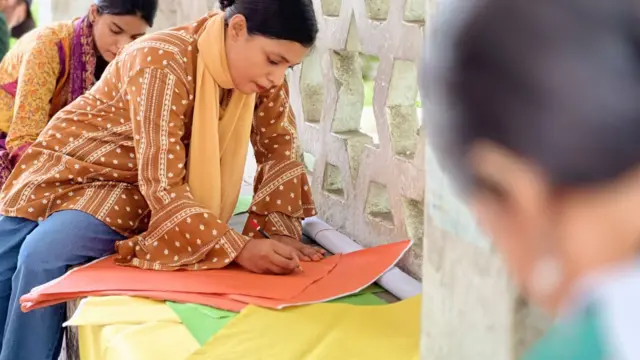 The protesting students are writing anti-quota posters