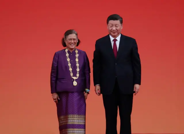 BEIJING, CHINA - SEPTEMBER 29: Chinese President Xi Jinping (R) pose for photos with Thai Princess Maha Chakri Sirindhorn after awarding her with a Friendship Medal at a presentation ceremony for national medals and national honorary titles at the Great Hall of the People (GHOP) on September 29, 2019 in Beijing, China. Chinese President Xi Jinping awards national medals and honorary titles to 42 individuals for their outstanding contributions to the country ahead of the 70th anniversary of the founding of the Peoples Republic of China on 01 October 2019. (Photo by How Hwee Young - Pool/Getty Images)
