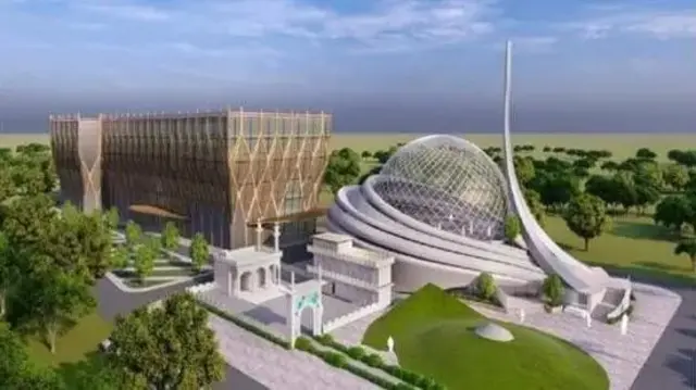 সবুজের মাঝখানে সাদা কাঠামোর মসজিদের নকশা