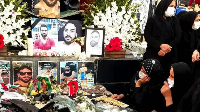Mourners at Navid's grave in Shiraz
