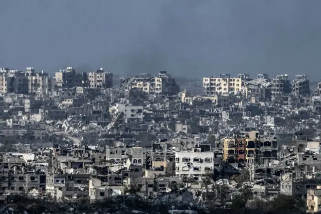 ইসরায়েলের হামলার গাজার ধ্বংস হয়ে যাওয়া একটি এলাকা