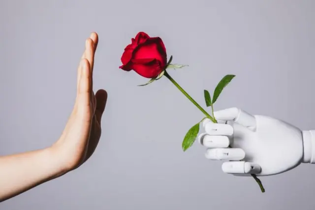 Robot offrant une rose et main la rejetant