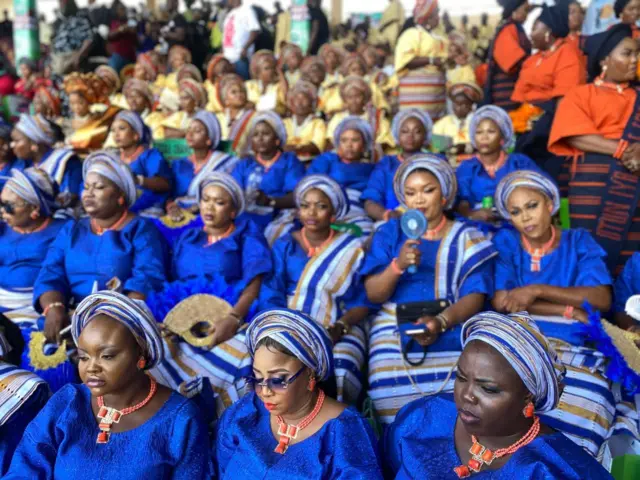 Women dressed in colourful attires