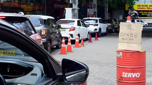 Vehicles queue at fuel stations in Colombo