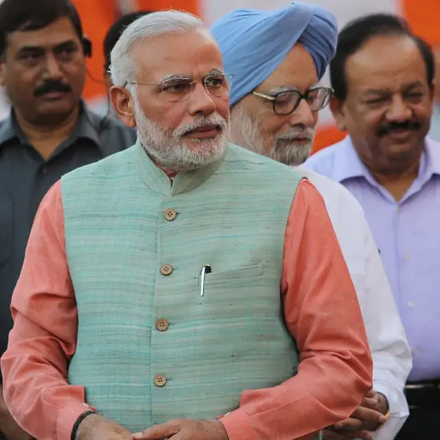 मोदी और मनमोहन सिंह