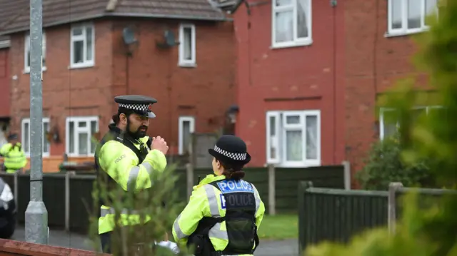 Police raid area around a Abedi's family property