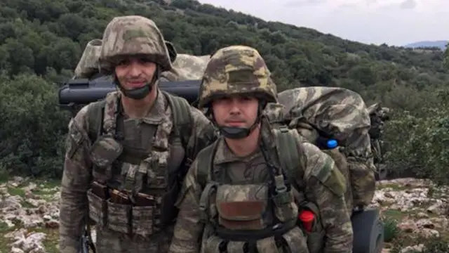 Oğuz Kaan Usta (sağda)