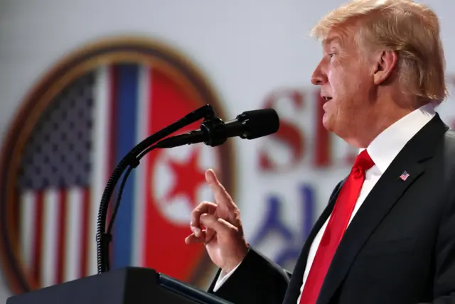 U.S. President Donald Trump speaks during a news conference after his meeting with North Korean leader Kim Jong Un at the Capella Hotel on Sentosa island in Singapore June 12, 2018. REUTERS/Jonathan Ernst