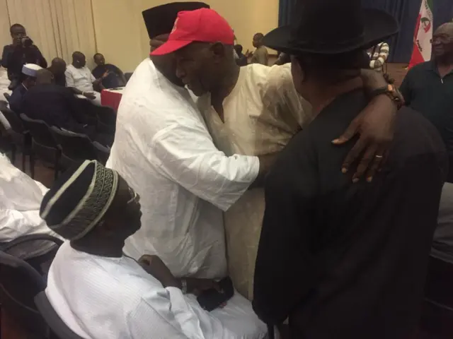 Buba Galadima wear red cap dey greet pipo