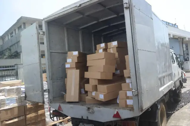 Boxes of election materials inside van