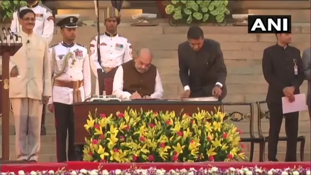 அமித் ஷா அமைச்சராக பதவியேற்றார்