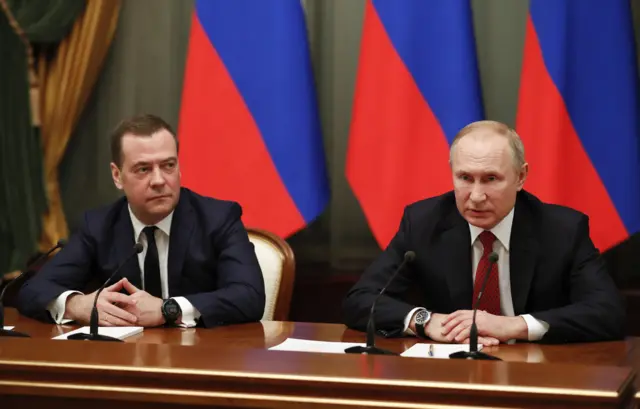 Медведев и Путин