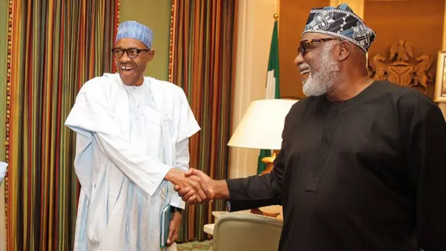 Buhari shake Aderedolu