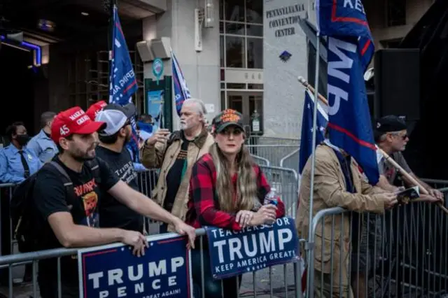 Dejected Trump fans hold rallies