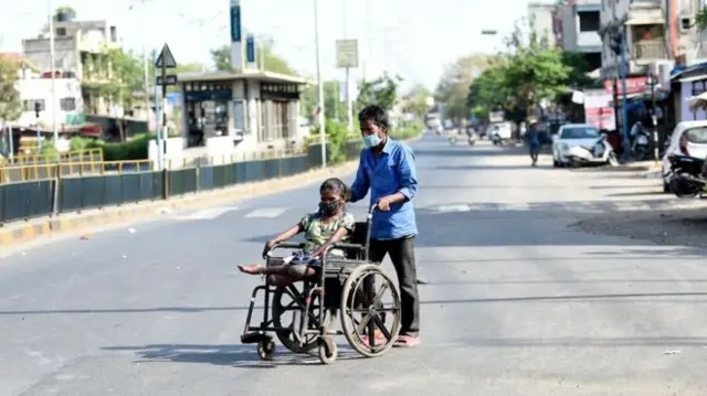 Namni Wheelchair irratti qaama miidhamaa dhiibaa