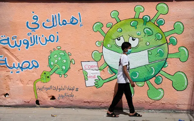 فن جداريات الكورونا يزين شوارع العالم