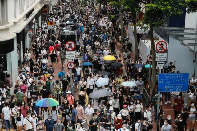 Anti-national security law protesters march at the anniversary of Hong Kong"s handover to China from Britain in Hong Kong, China July 1, 2020
