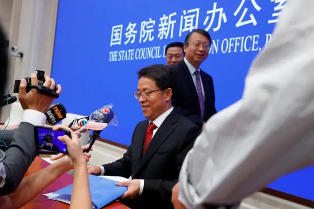 Zhang Xiaoming, Executive Deputy Director of Hong Kong and Macau Affairs Office of the State Council are seen at the end of a news conference about the new national security laws for Hong Kong at the State Council Information Office in Beijing, China July 1, 2020