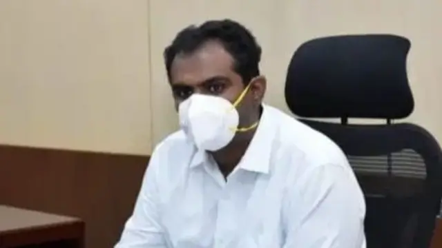 மதுரை மாவட்ட ஆட்சியர்.