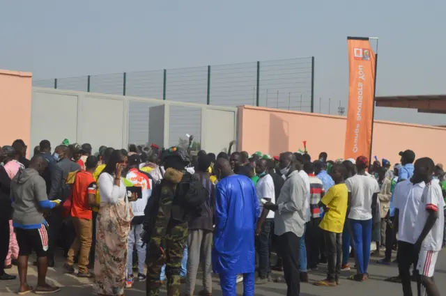Fans enter stadium