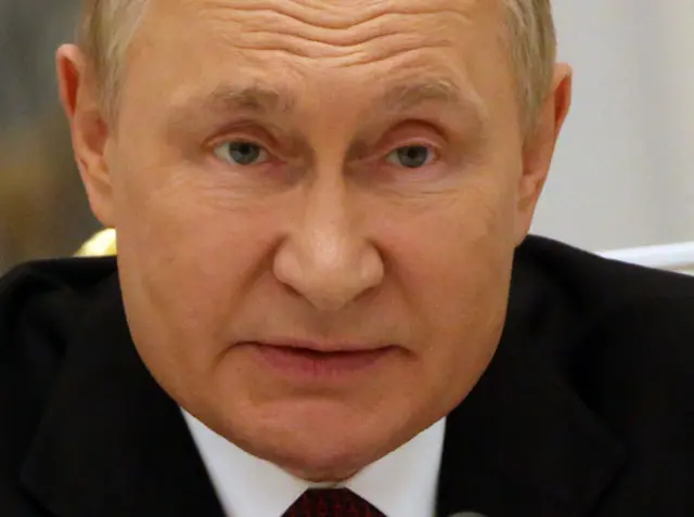 путін