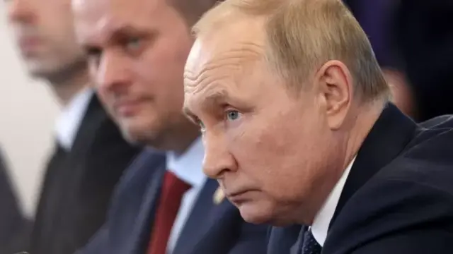 Путин
