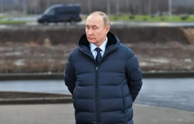 Путин