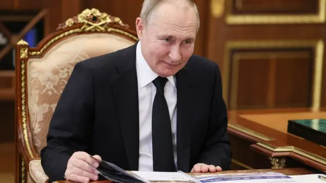 Путин