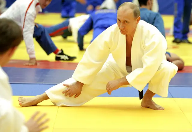 путін