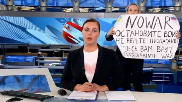 Protester on set of the Vremya news programme