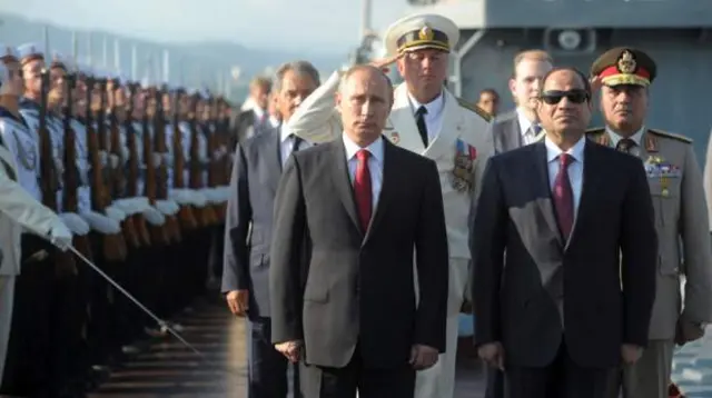 August 2014: Russia's President Vladimir Putin and Egyptian President Abdul Fattah al-Sisi on board in the Russian port Sochi