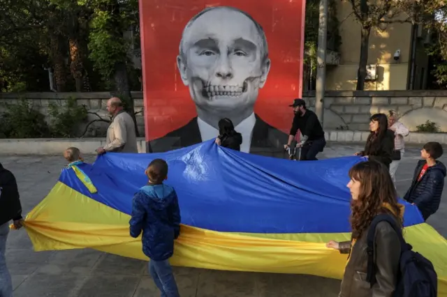 путін