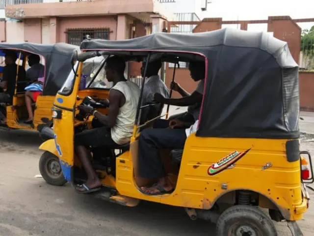 Tricycle wit passengers