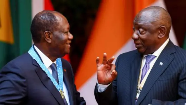 Rais wa Ivory Coast Alassane Ouattara (kushoto) yuko katika ziara ya kiserikali nchini Afrika Kusini - anaonekana hapa na mwenzake wa Afrika Kusini Cyril Ramaphosa