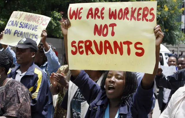 Old foto of Zimbabwean civil servants demonstrate for streets of Harare on February 19, 2009.