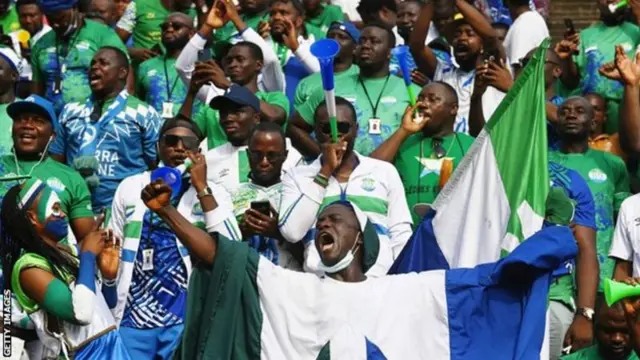 Sierra Leone fans watch di men national side for di Africa Cup of Nations early dis year
