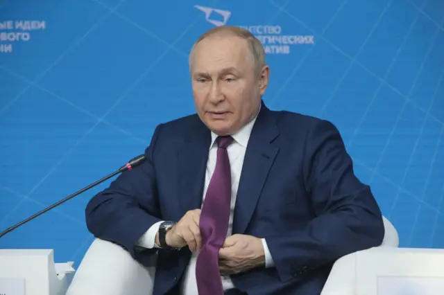 путін