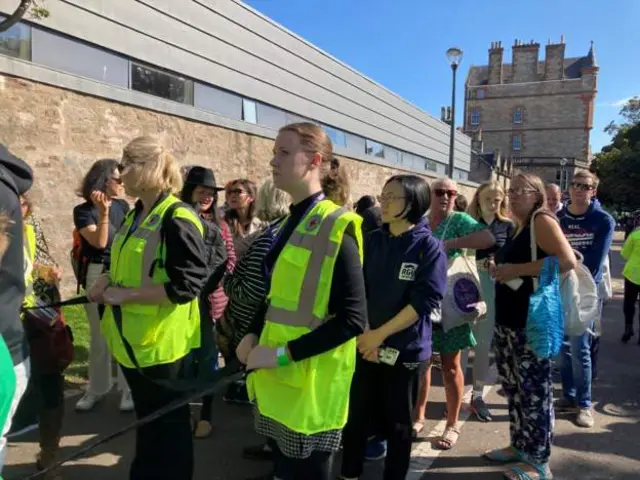 The end of the queue - those behind the tape won’t get in